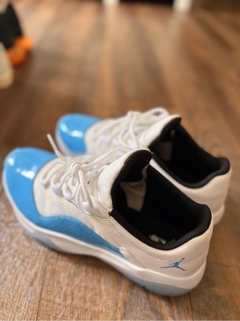 Nike Jordan 11 Blue and White Low-Top Athletic Sneakers